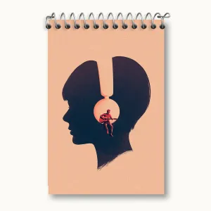 دفتر یادداشت دختر و هدفون